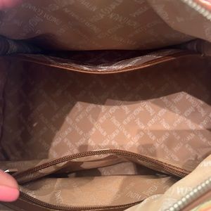 Pinks and oranges purse. Used but very good condition.